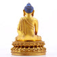 A gilt bronze statue of Gautama Buddha