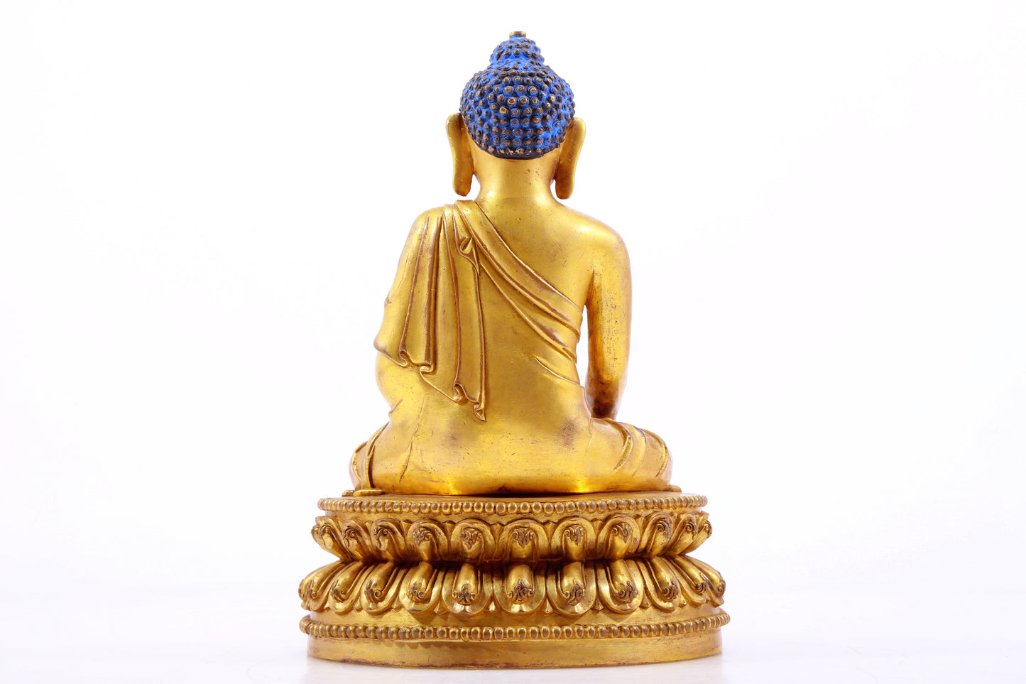 A gilt bronze statue of Gautama Buddha