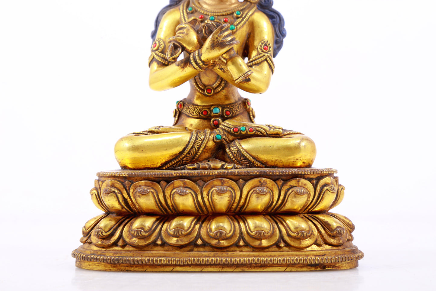 A gilt bronze statue of Vajrasattva inlaid with hundreds of treasures