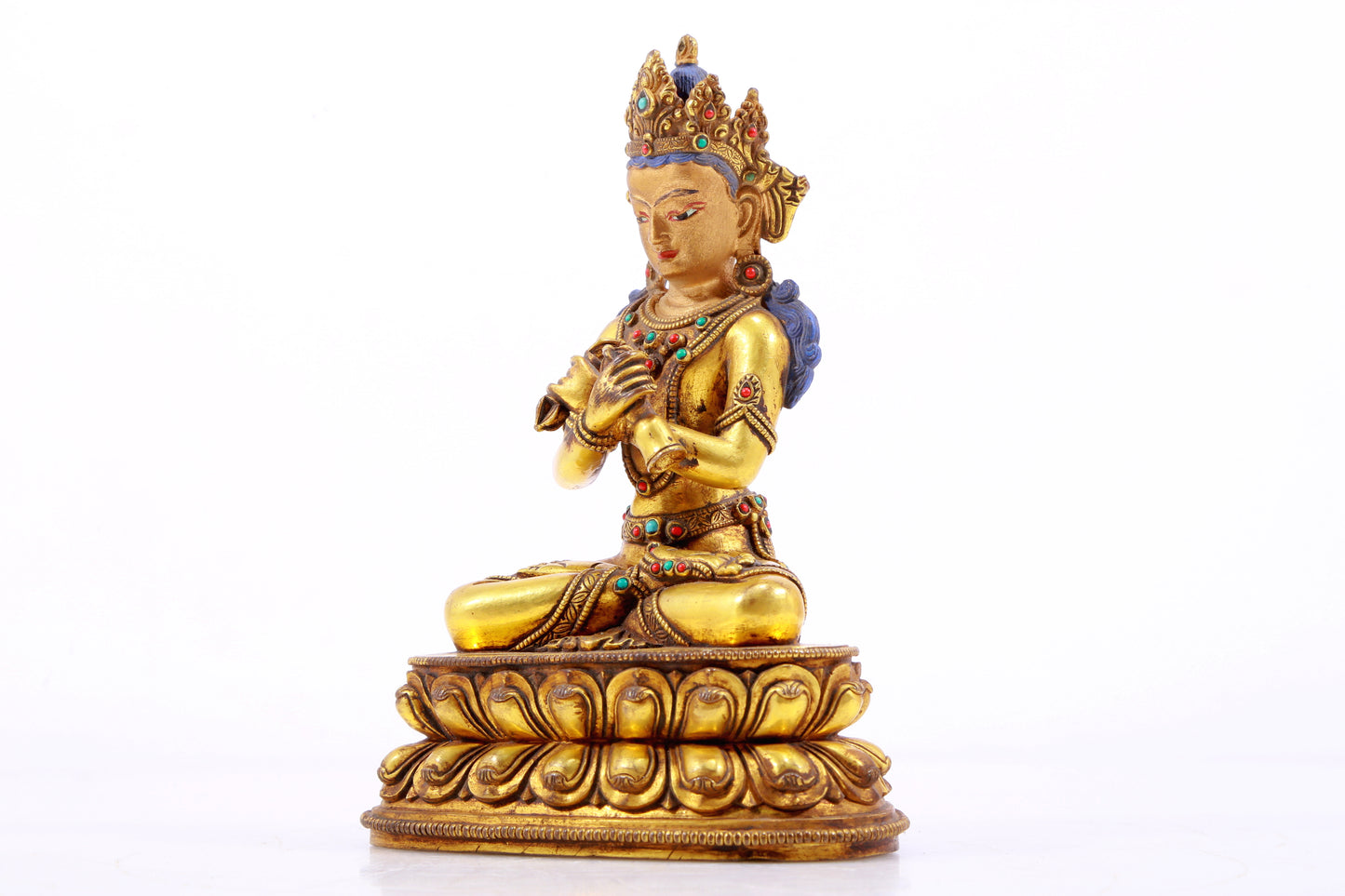 A gilt bronze statue of Vajrasattva inlaid with hundreds of treasures