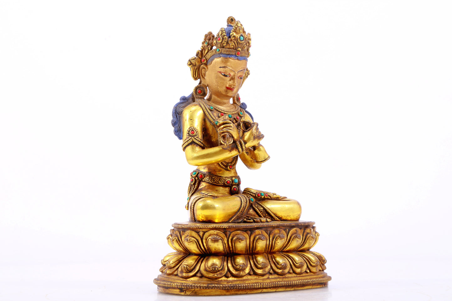 A gilt bronze statue of Vajrasattva inlaid with hundreds of treasures