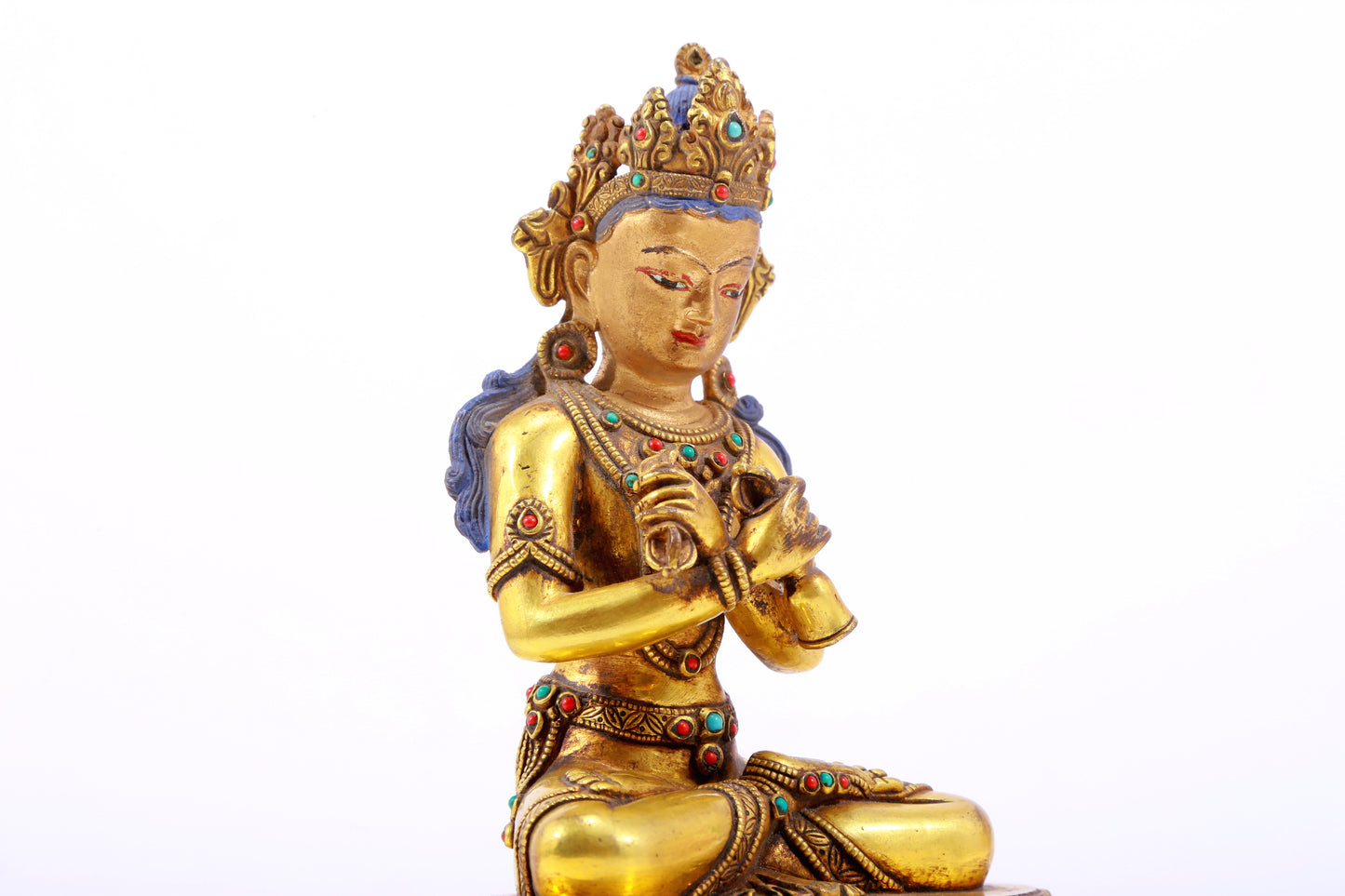 A gilt bronze statue of Vajrasattva inlaid with hundreds of treasures