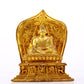 A gilt bronze statue of the guru