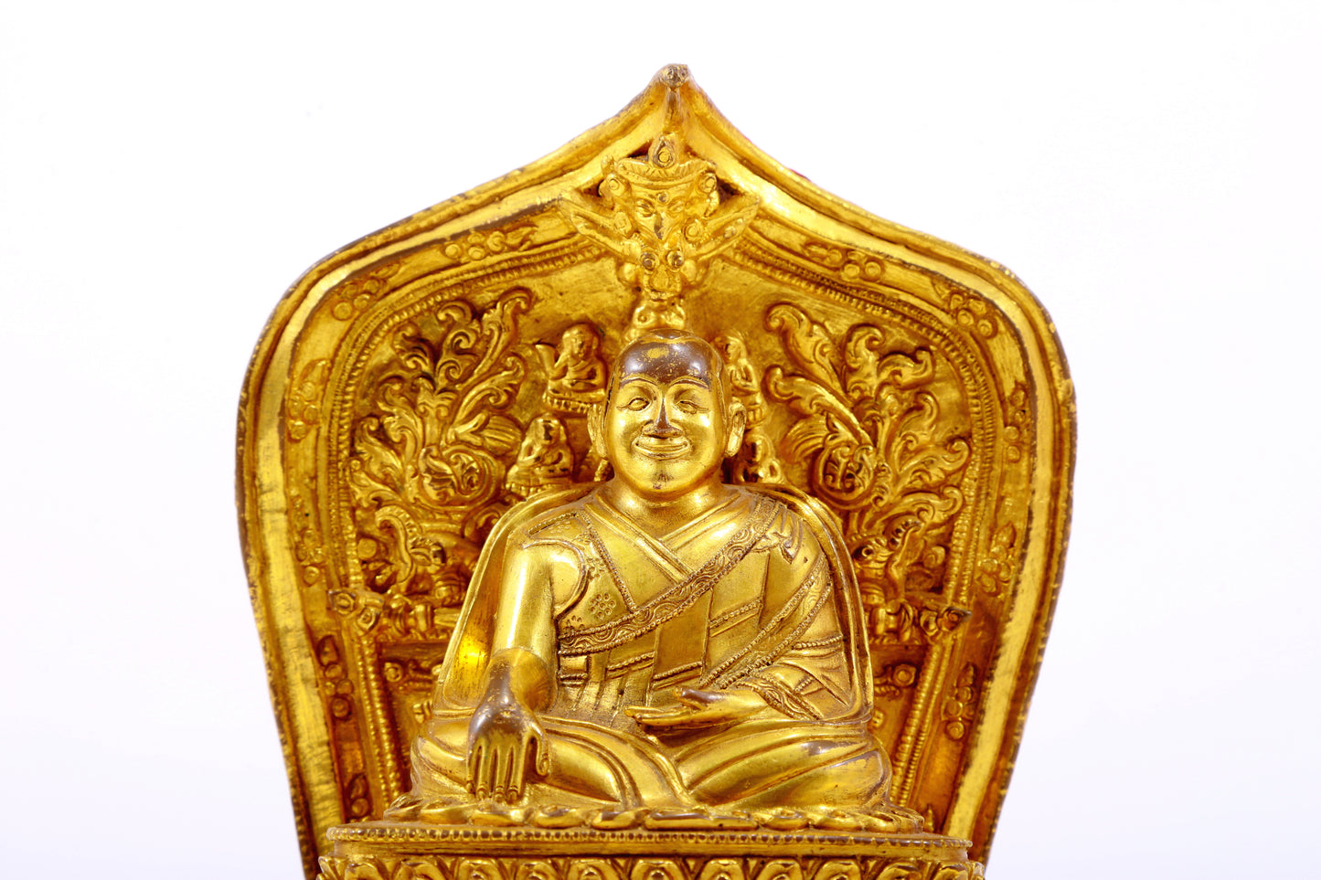 A gilt bronze statue of the guru