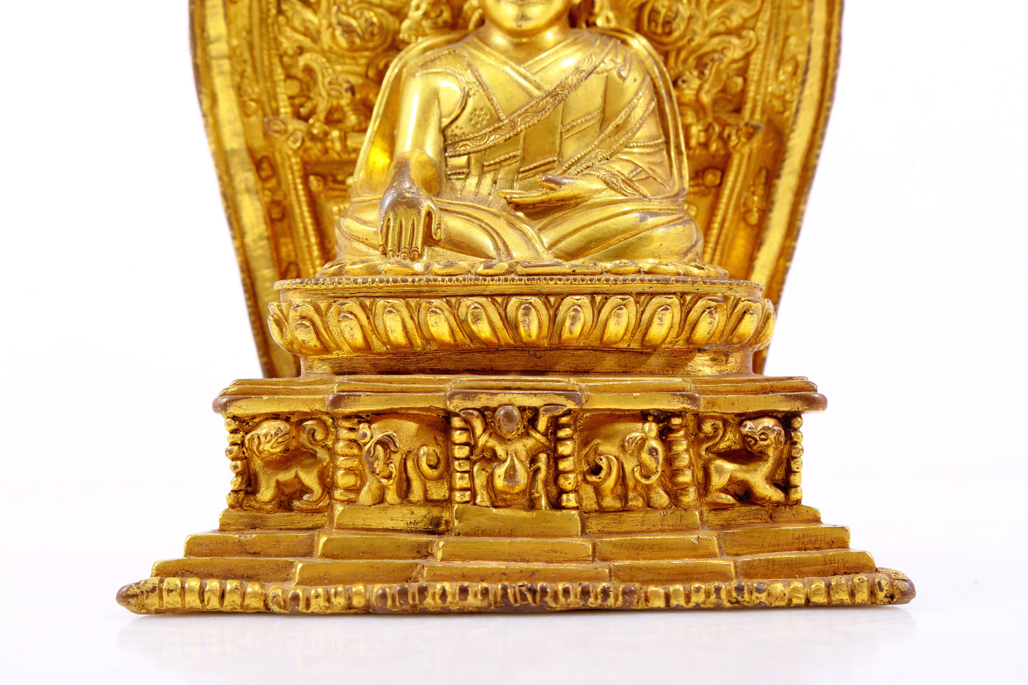 A gilt bronze statue of the guru