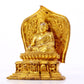 A gilt bronze statue of the guru