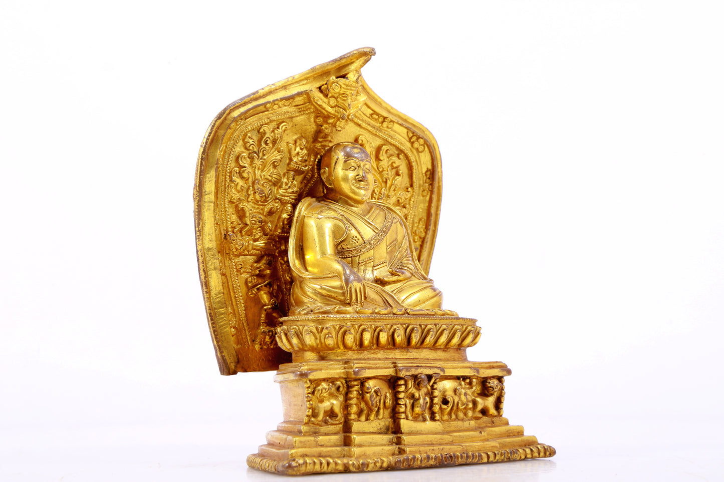 A gilt bronze statue of the guru