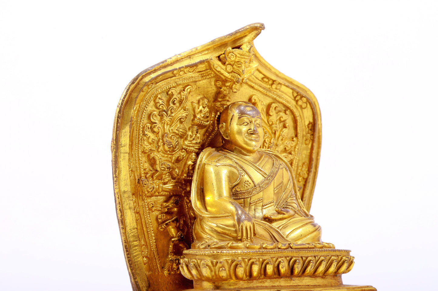 A gilt bronze statue of the guru