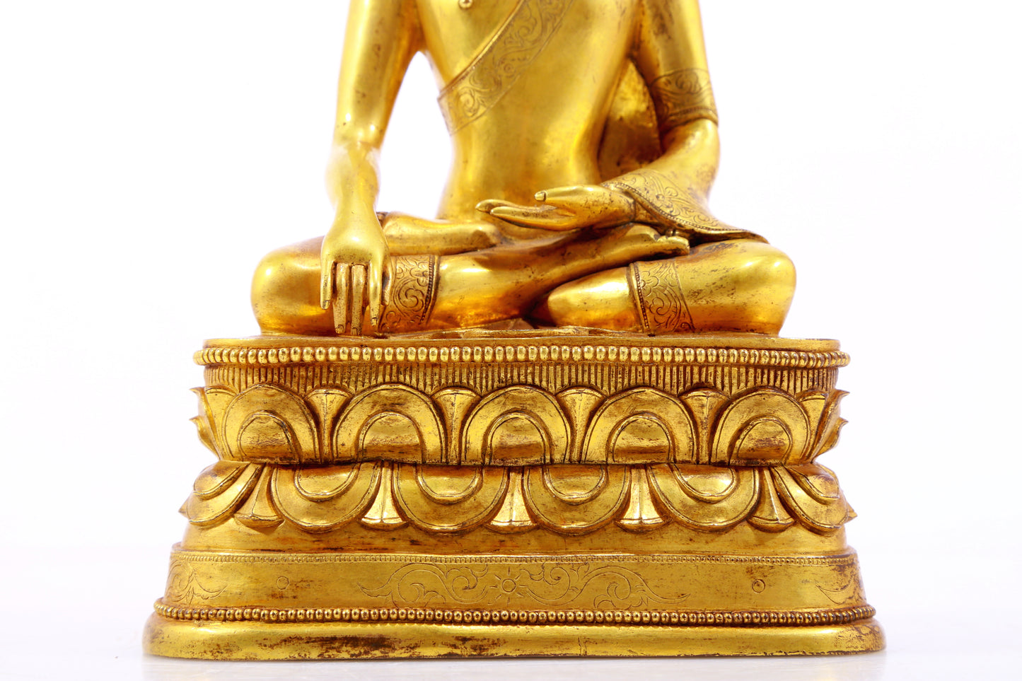 A gilt bronze statue of Gautama Buddha