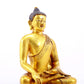 A gilt bronze statue of Gautama Buddha