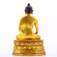 A gilt bronze statue of Gautama Buddha