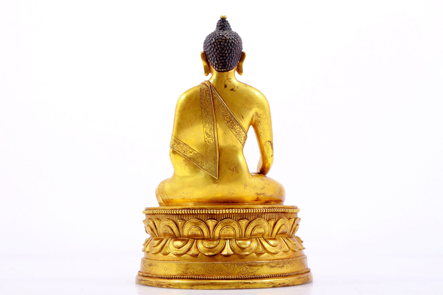 A gilt bronze statue of Gautama Buddha