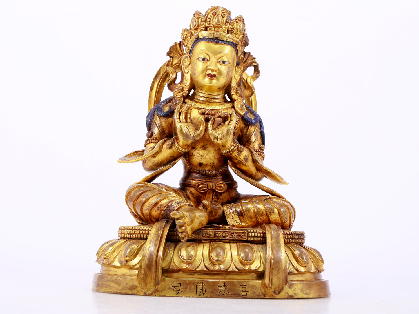 A gilt bronze statue of the Buddha