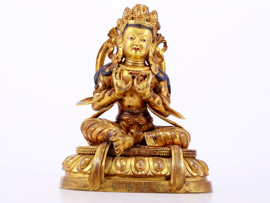 A gilt bronze statue of the Buddha