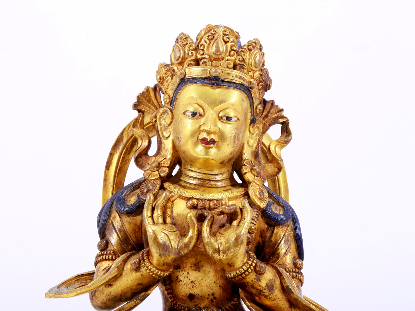 A gilt bronze statue of the Buddha