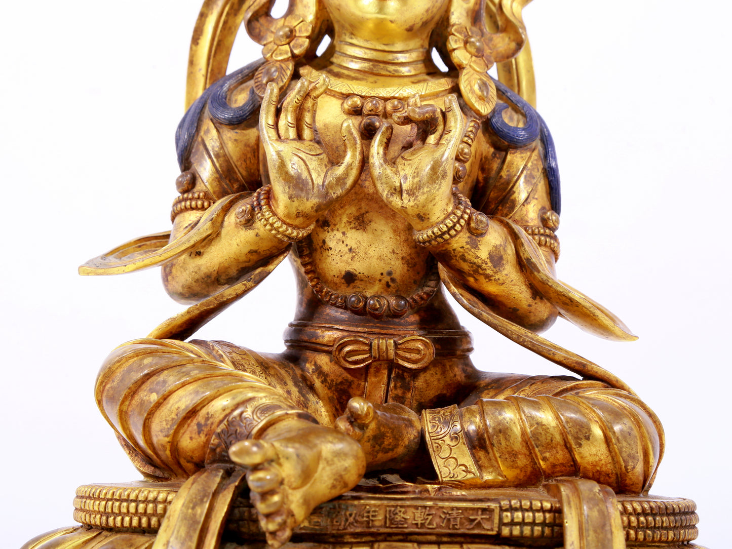 A gilt bronze statue of the Buddha