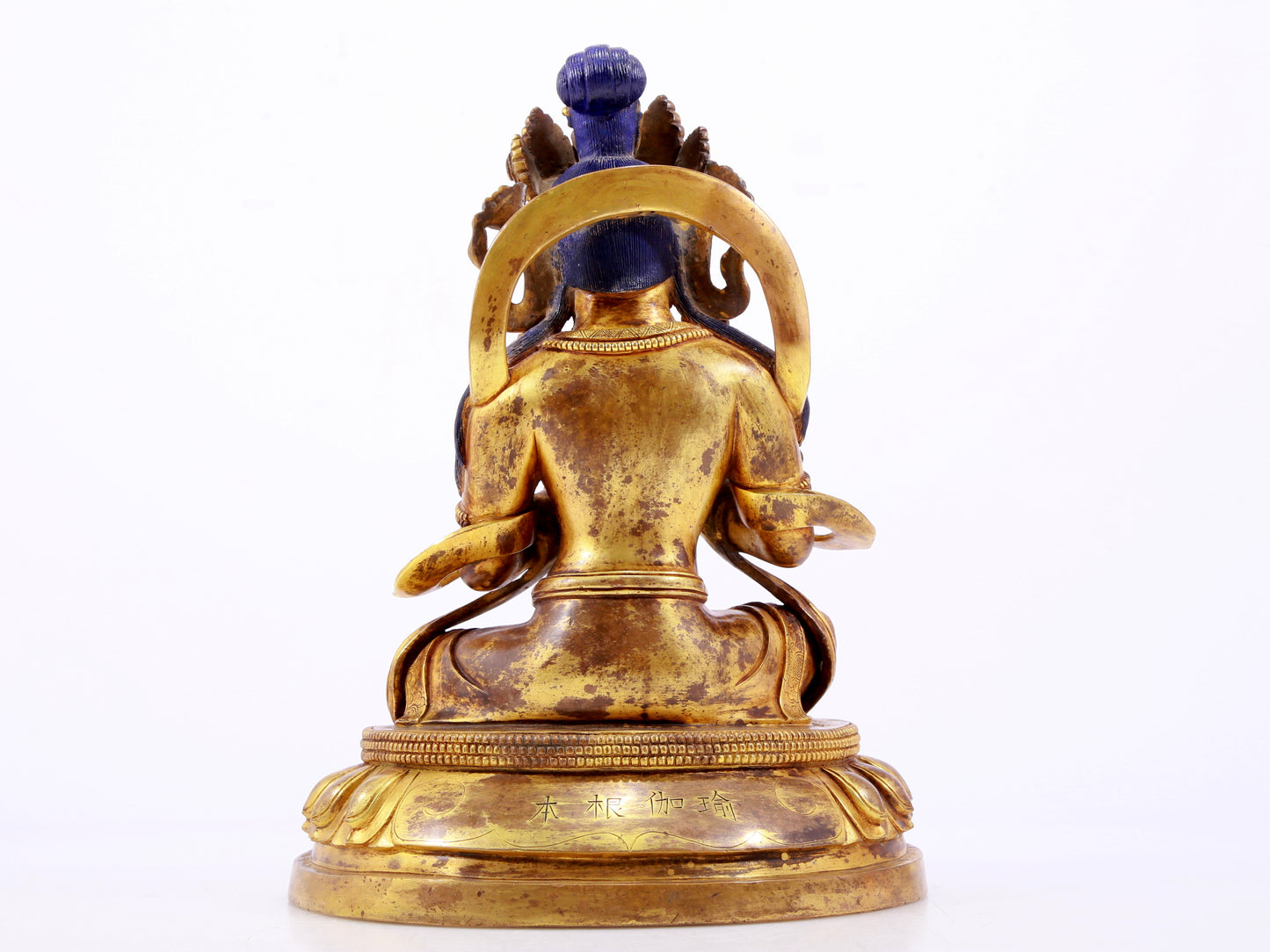 A gilt bronze statue of the Buddha