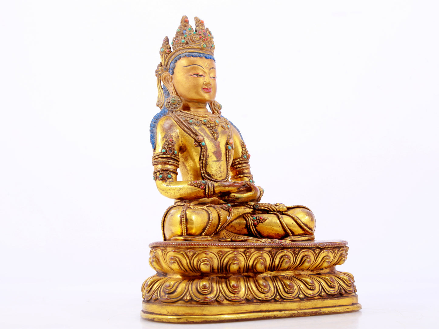 A gilt bronze statue of Amitayus Buddha inlaid with hundreds of treasures