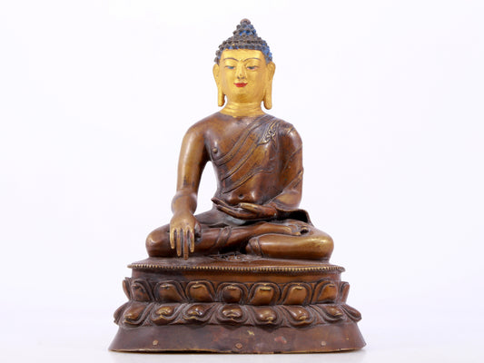 A gilt bronze statue of Gautama Buddha