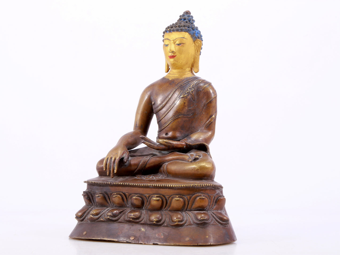 A gilt bronze statue of Gautama Buddha