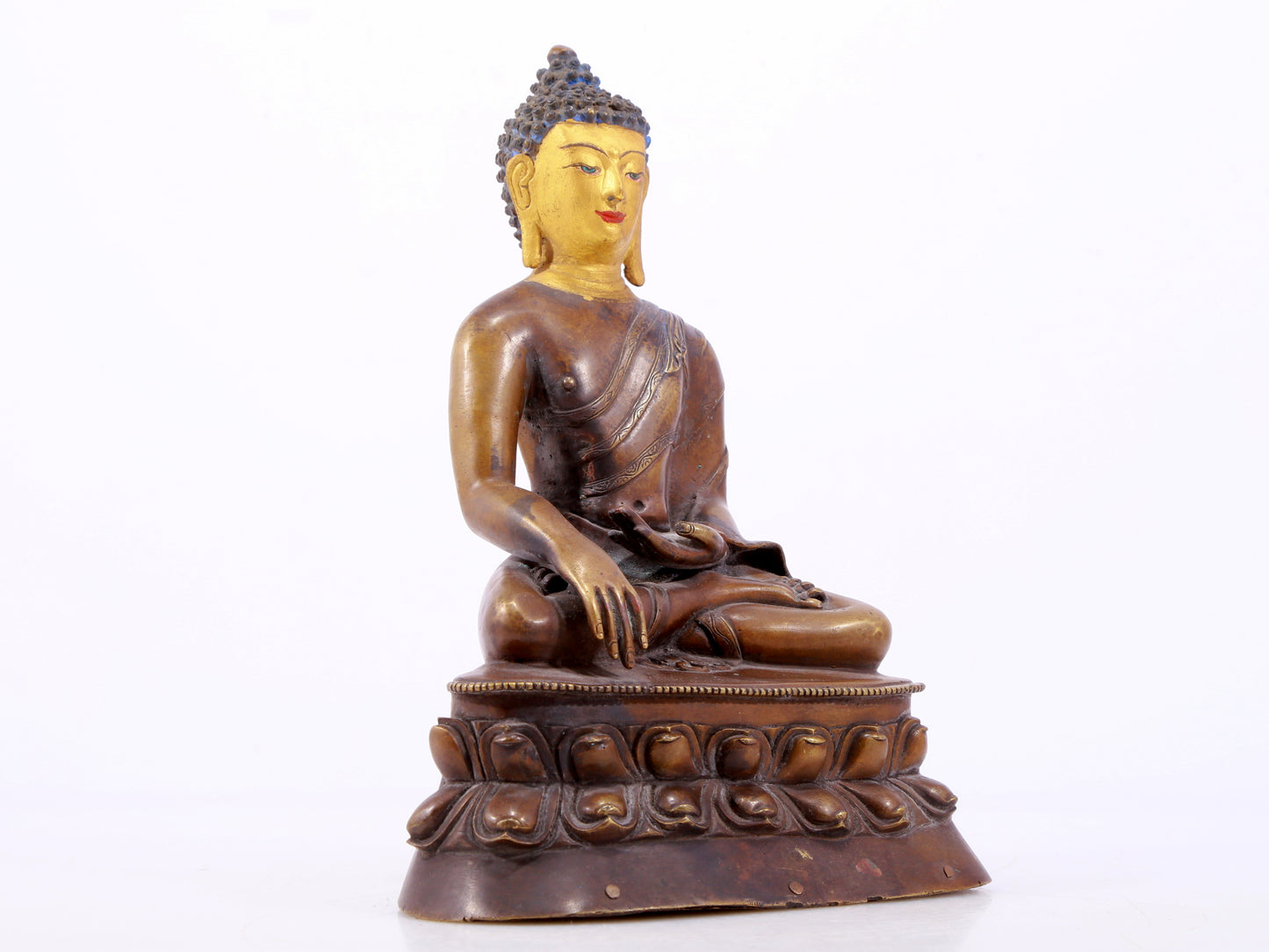 A gilt bronze statue of Gautama Buddha