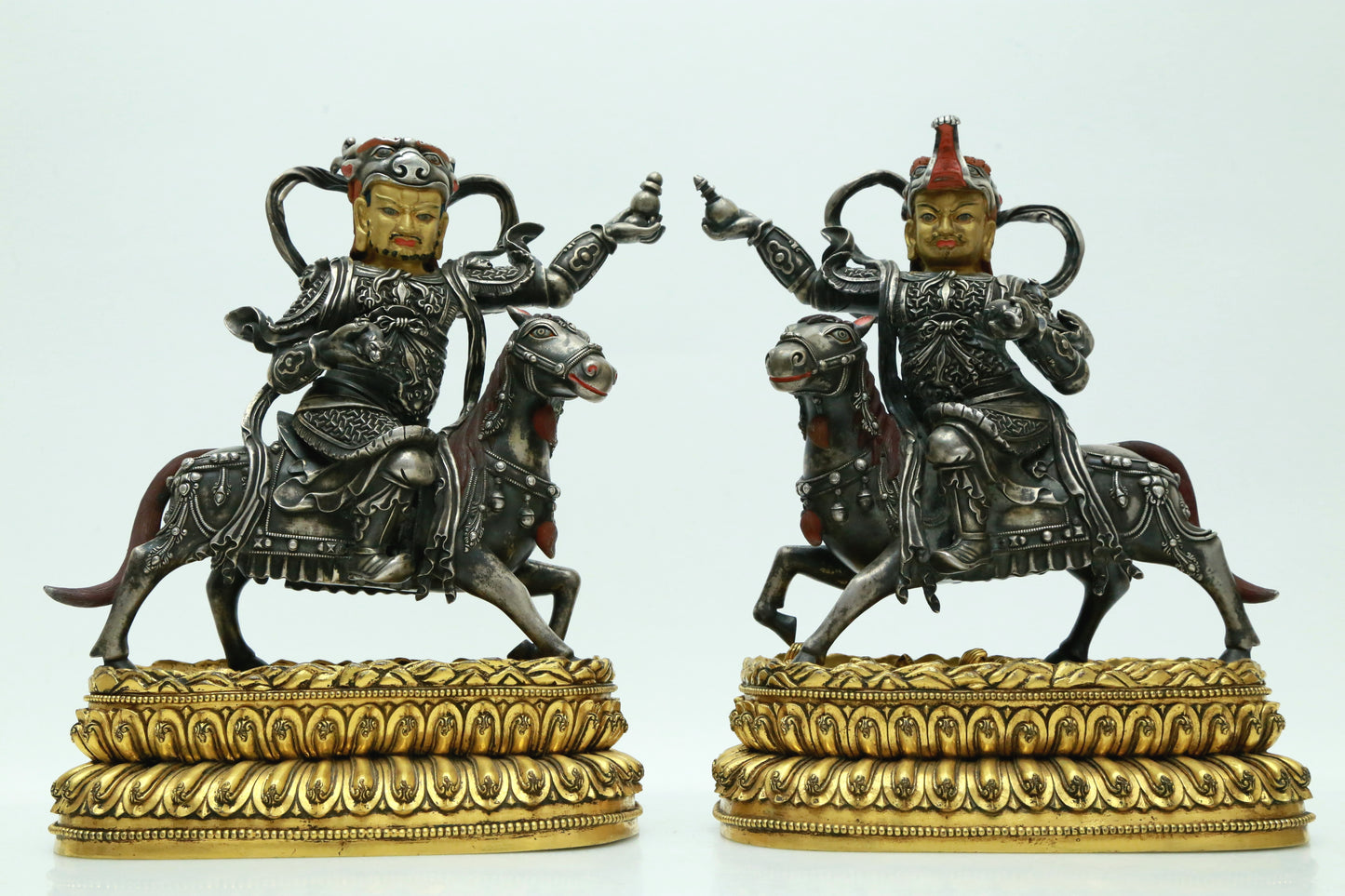 A Magnificent Pair Of Gilt-Bronze Silver Figures Of Kubera Seated On Horses