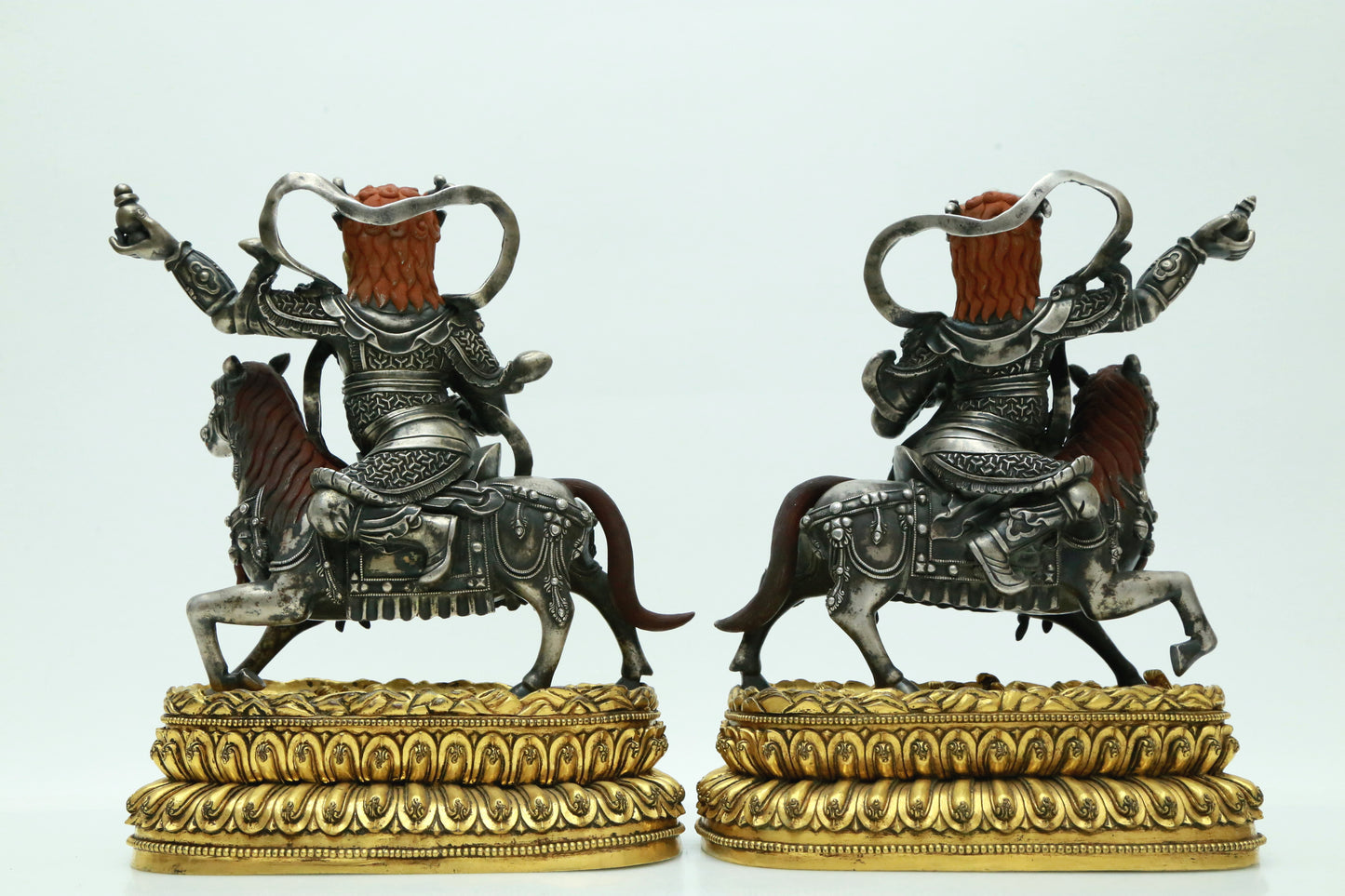 A Magnificent Pair Of Gilt-Bronze Silver Figures Of Kubera Seated On Horses