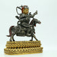 A Magnificent Pair Of Gilt-Bronze Silver Figures Of Kubera Seated On Horses