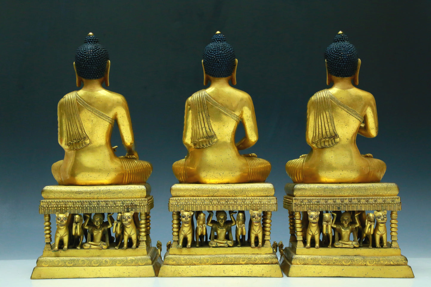 Three Brilliant Gilt-Bronze Figures Of Buddha Shakyamuni