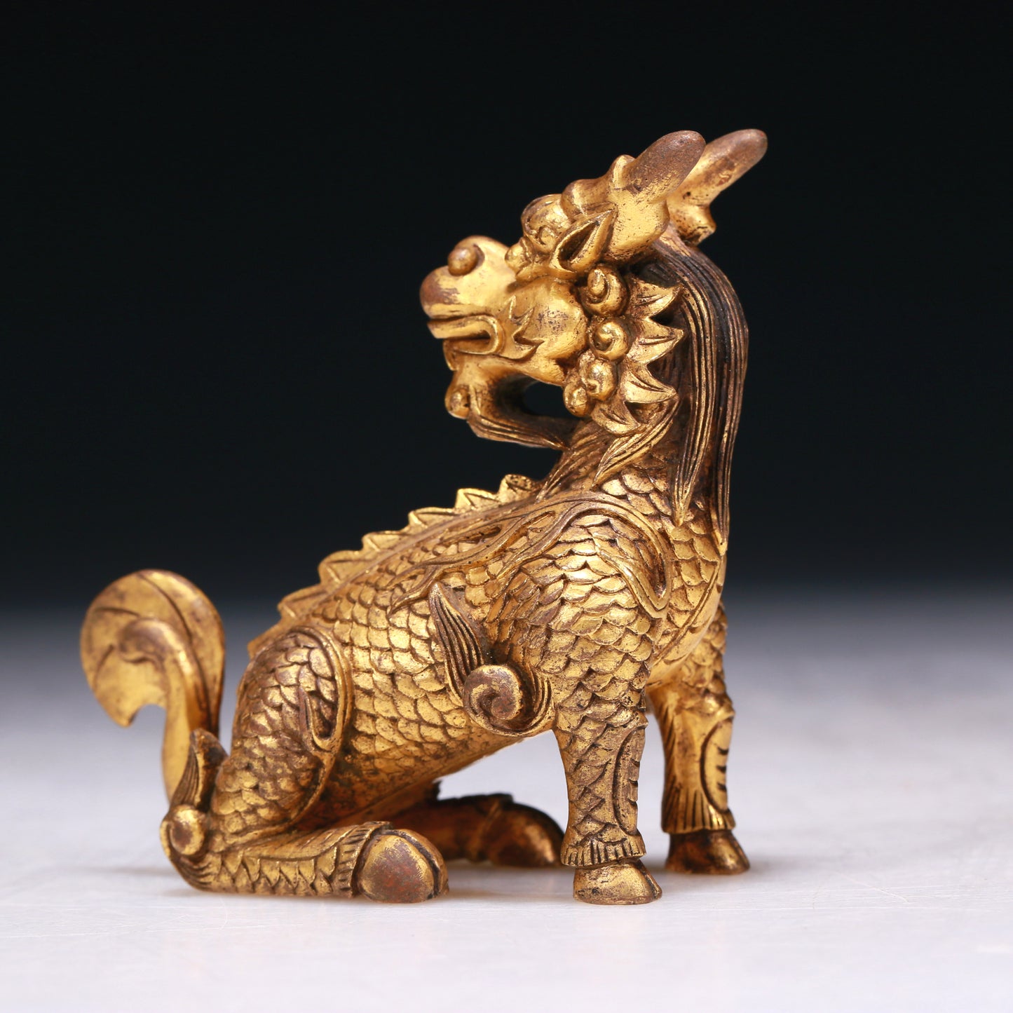 A Brilliant Gilt-Bronze Kylin