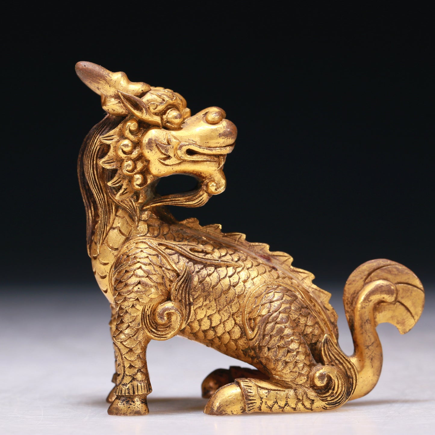 A Brilliant Gilt-Bronze Kylin