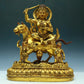 A Wonderful Gilt-Bronze Figure Of Kubera Seated On A Horse