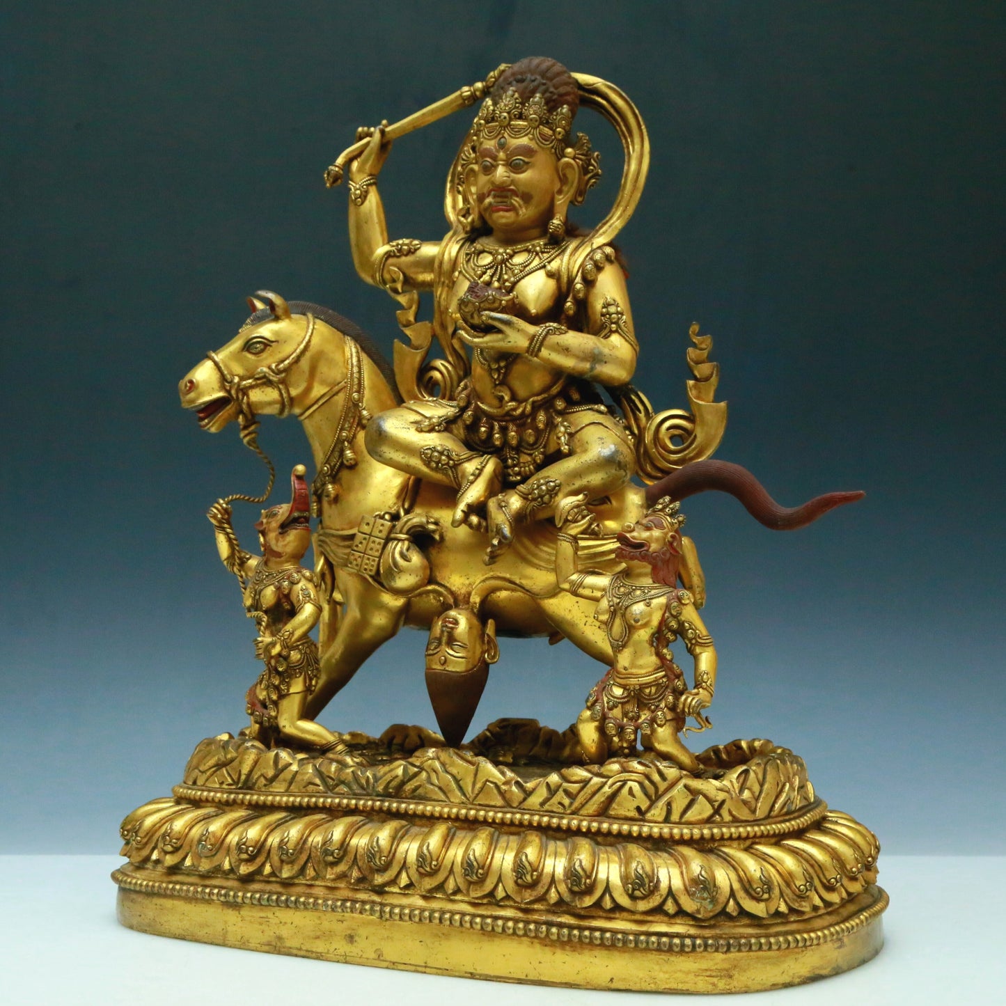 A Wonderful Gilt-Bronze Figure Of Kubera Seated On A Horse