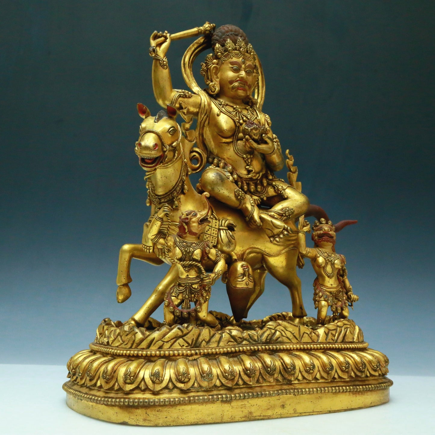 A Wonderful Gilt-Bronze Figure Of Kubera Seated On A Horse