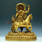 A Wonderful Gilt-Bronze Figure Of Kubera Seated On A Horse