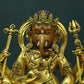 A Wonderful Gilt-Bronze Figure Of Kubera With An Elephant's Trunk