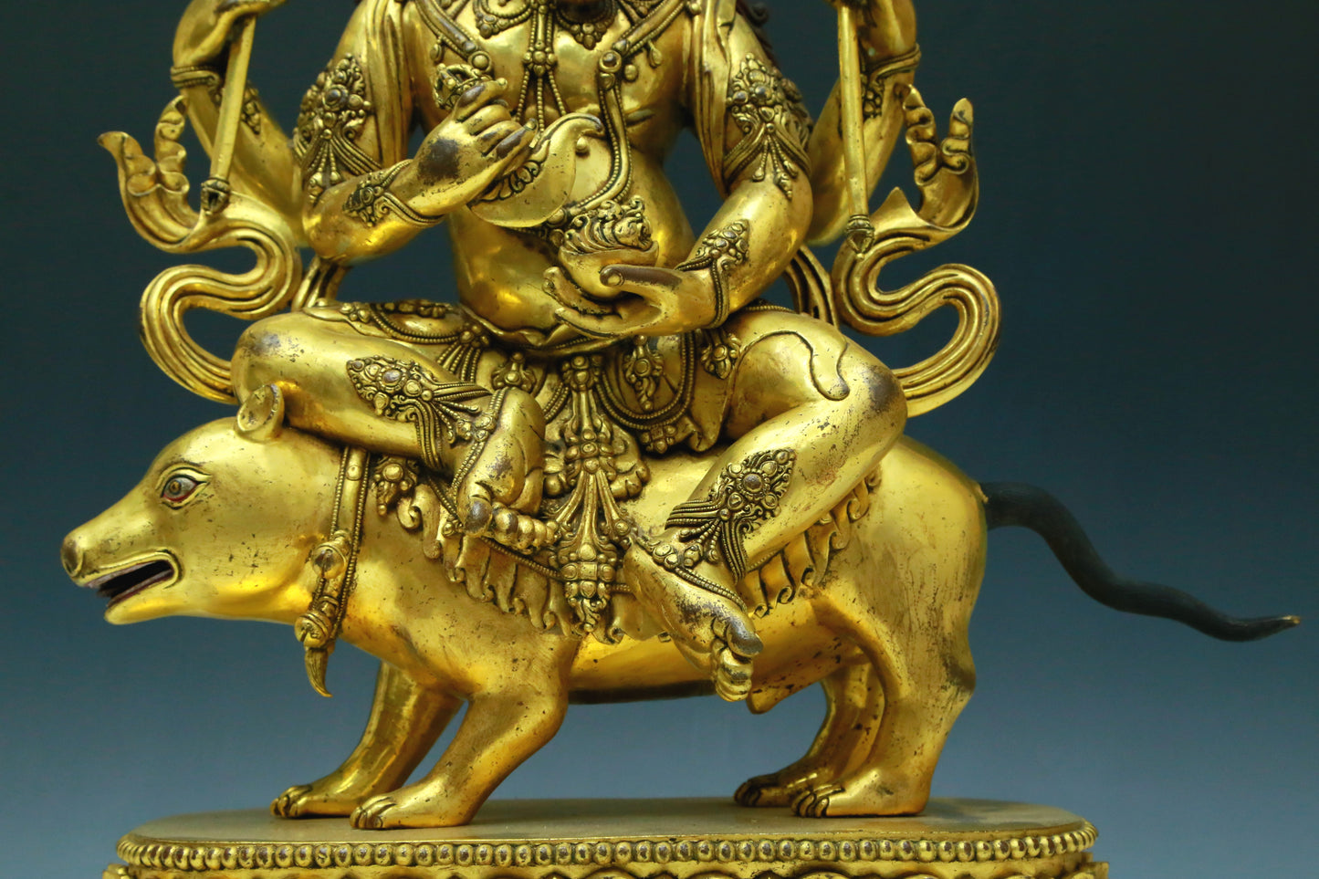 A Wonderful Gilt-Bronze Figure Of Kubera With An Elephant's Trunk