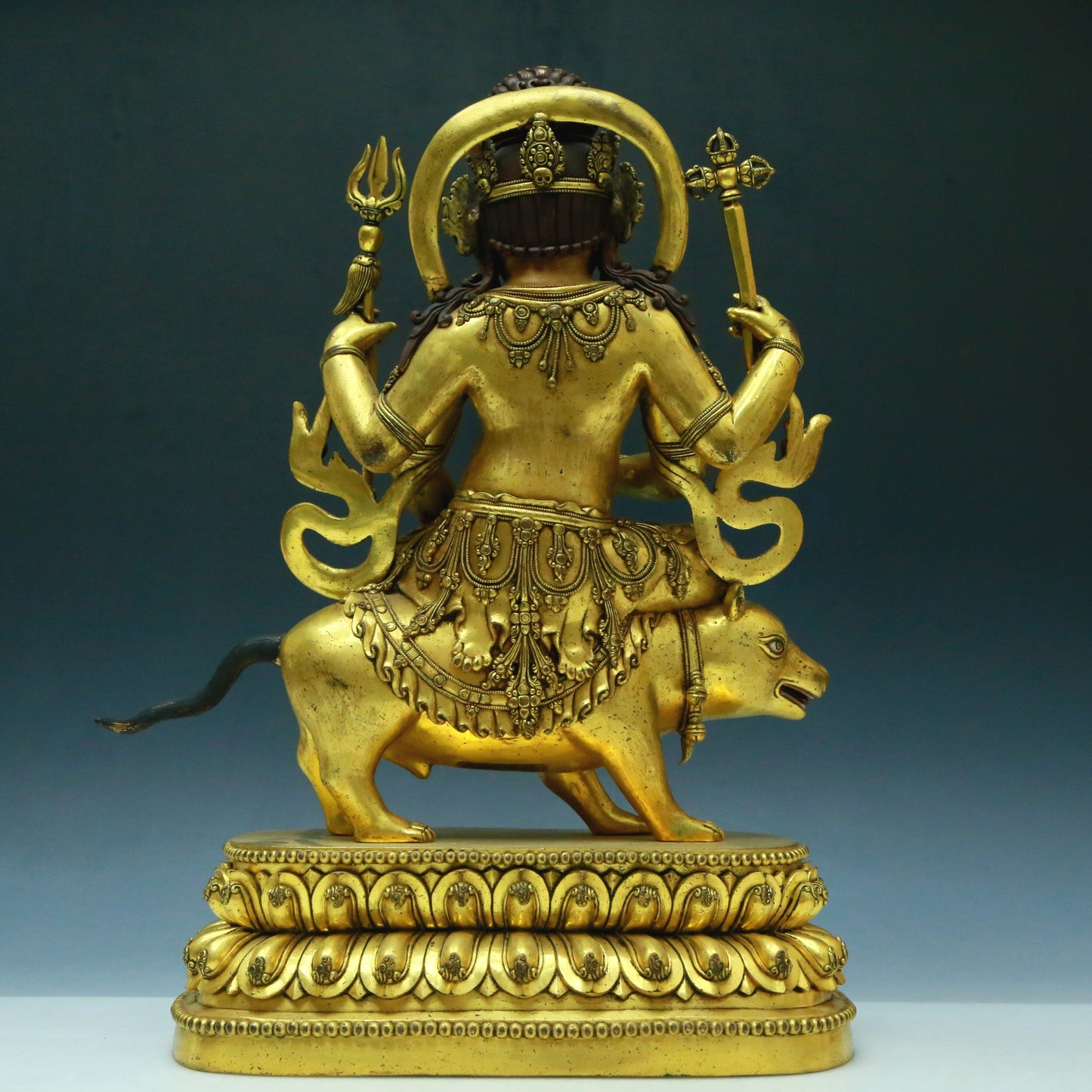 A Wonderful Gilt-Bronze Figure Of Kubera With An Elephant's Trunk