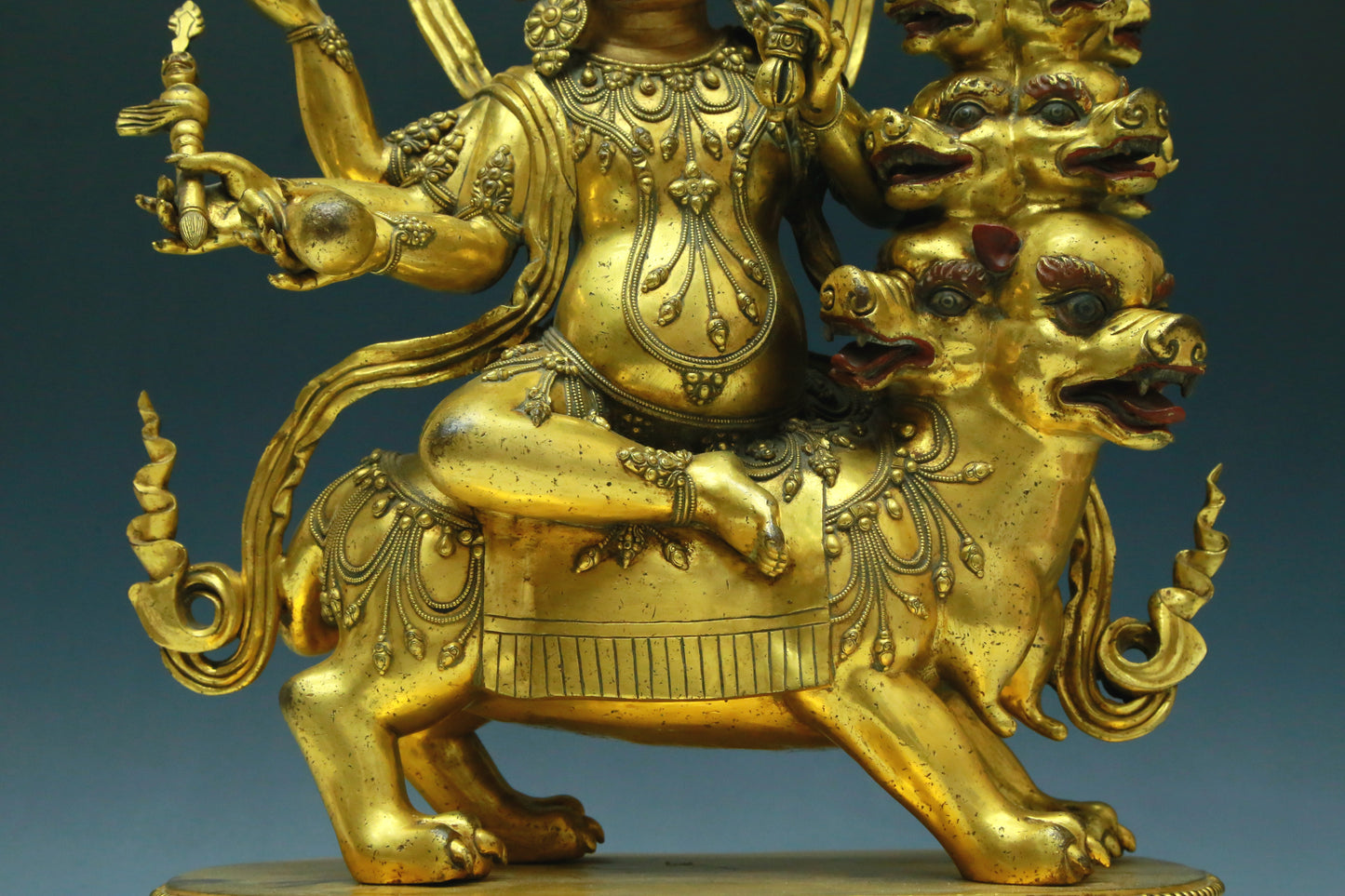 A Wonderful Gilt-Bronze Figure Of Vajrapani Seated On A Beast