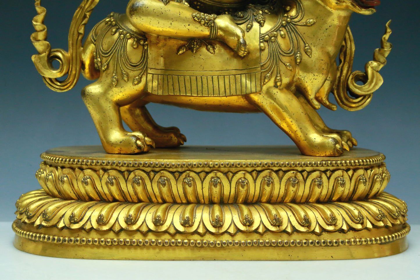 A Wonderful Gilt-Bronze Figure Of Vajrapani Seated On A Beast