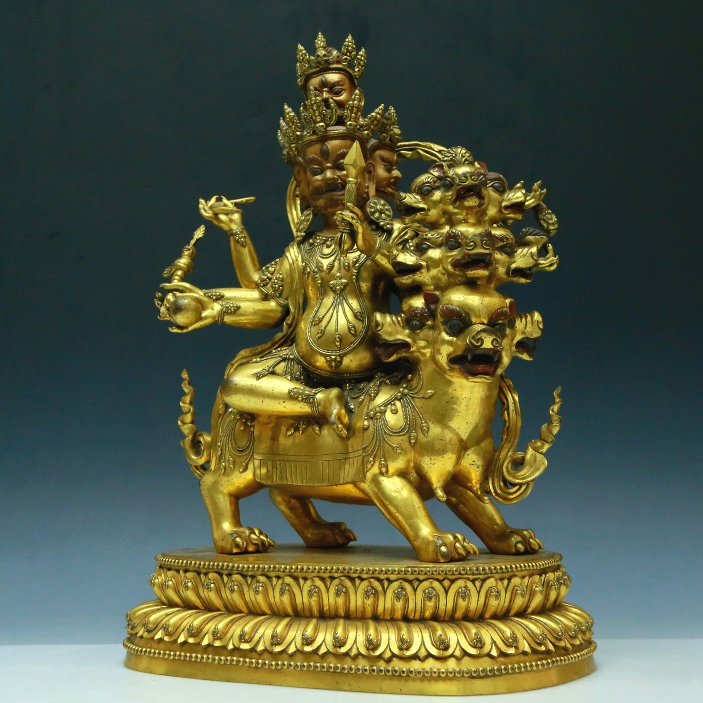 A Wonderful Gilt-Bronze Figure Of Vajrapani Seated On A Beast