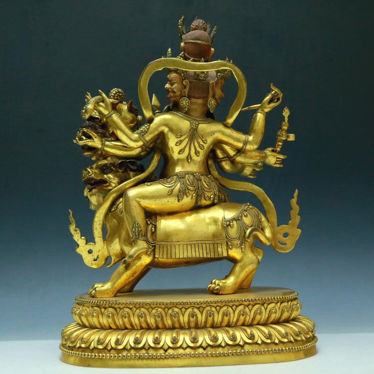 A Wonderful Gilt-Bronze Figure Of Vajrapani Seated On A Beast