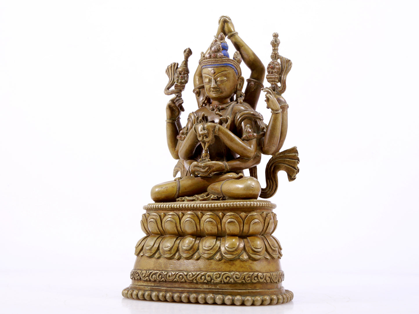 A solemn alloy copper inlaid silver eight-armed Guanyin statue