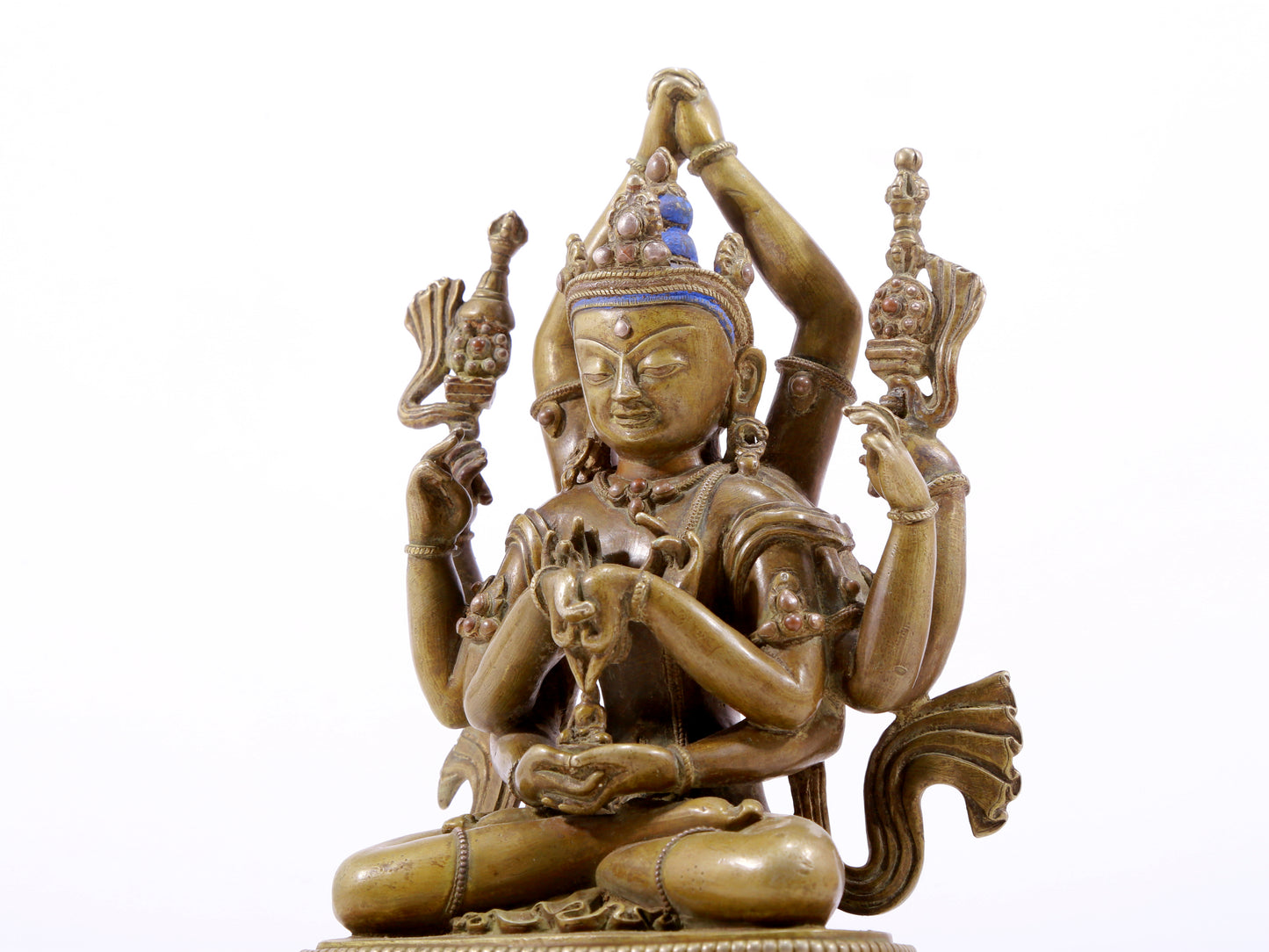 A solemn alloy copper inlaid silver eight-armed Guanyin statue