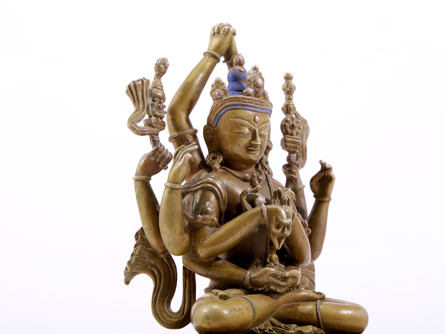 A solemn alloy copper inlaid silver eight-armed Guanyin statue