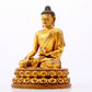 A majestic gilt bronze statue of Sakyamuni