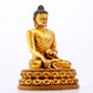 A majestic gilt bronze statue of Sakyamuni