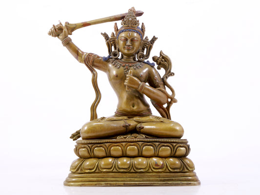 A majestic alloy copper inlaid silver statue of Manjusri Bodhisattva