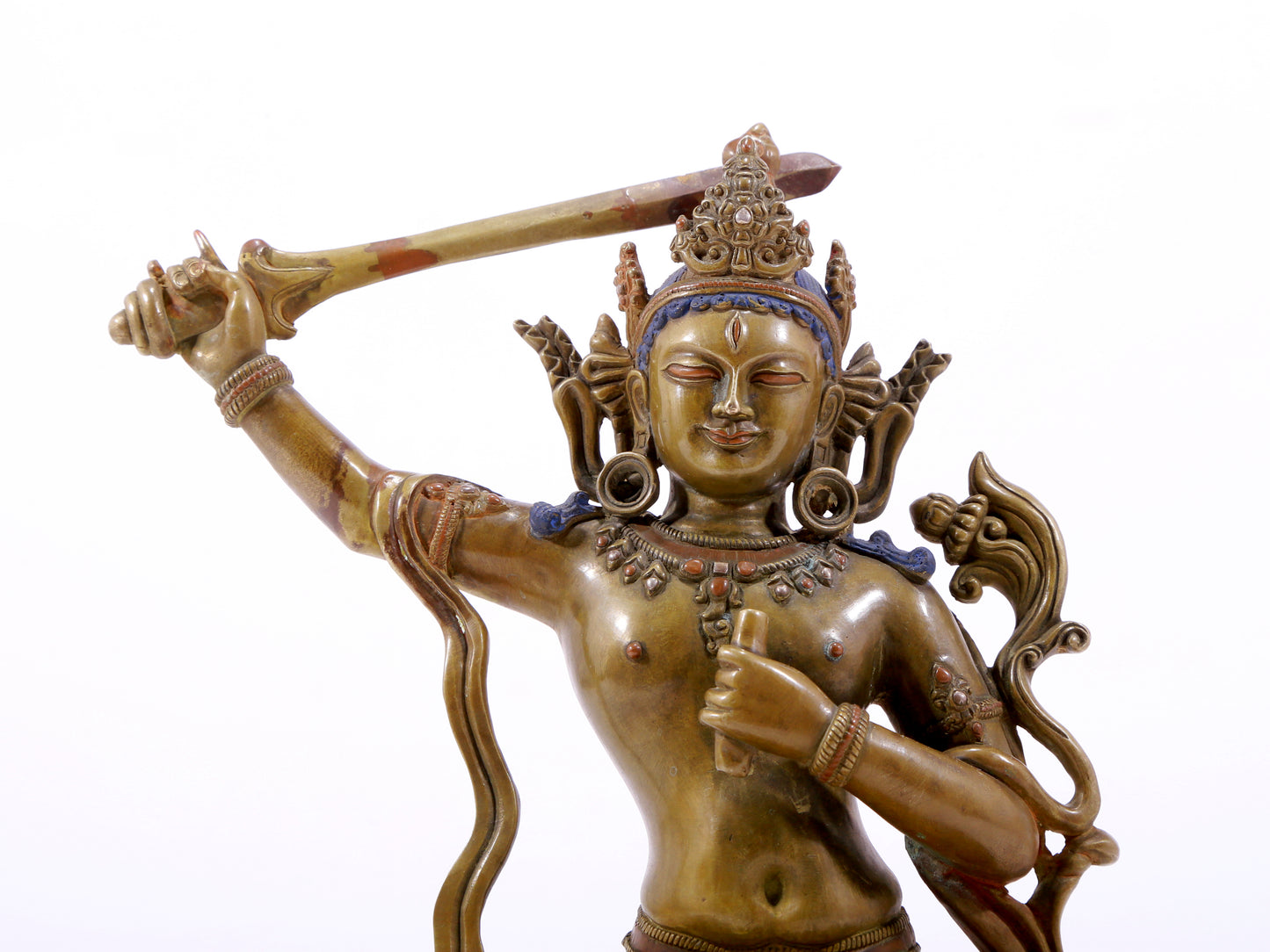 A majestic alloy copper inlaid silver statue of Manjusri Bodhisattva