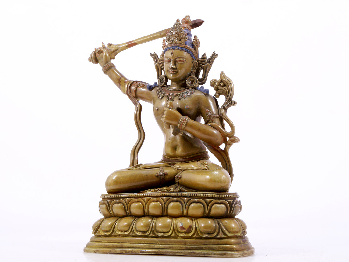 A majestic alloy copper inlaid silver statue of Manjusri Bodhisattva